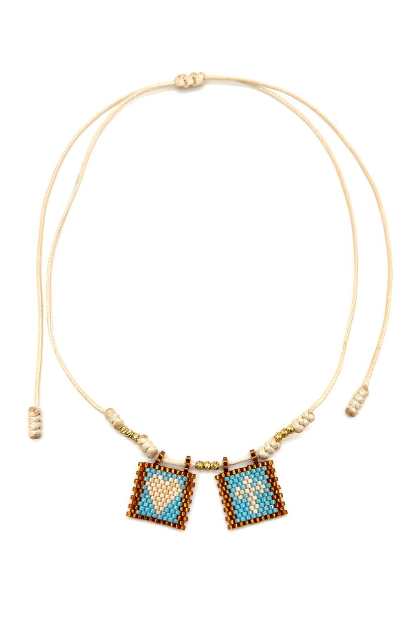 SHOKER CORAZÓN CRUZ BEIGE