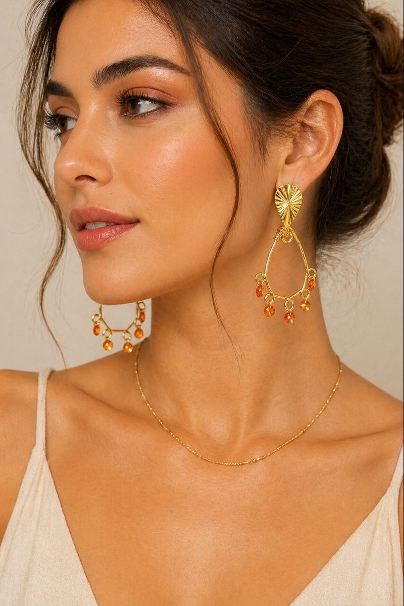 ARETES BRONCE ORO CRY ASTRAL